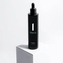 Insignia London No. 1 Luxury Rosehip Oil 100ml black glass dropper bottle displayed on white pedestal